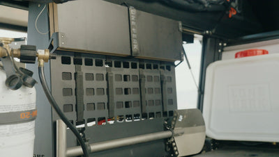Gear Vault (with 2 tables) — alternate angle showing 4 Gear Bags included