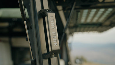 Grab Handles — solid aluminum grab handles for the Lone Peak Camper V2 T-slot system; corner T-slot mount, assists entry