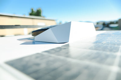 Roof Vent Fan Fairing — aerodynamic 4mm aluminum composite fairing that prevents wind lift on the Camper V2 roof vent fan; VHB tape installation