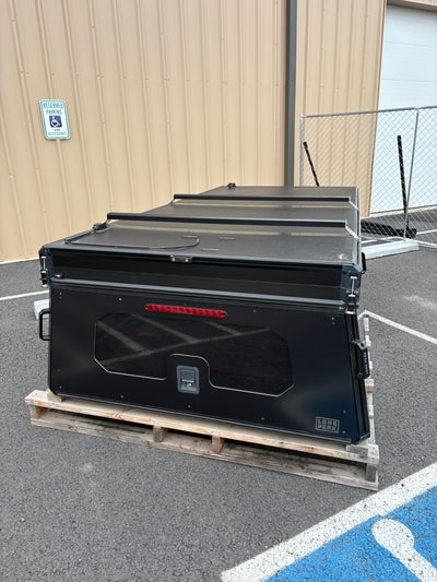Used Tall V1 — Toyota Tacoma 5 ft Bed — used Lone Peak TALL V1 camper for 2016-2023 Toyota Tacoma 5 ft bed; cab passthrough window