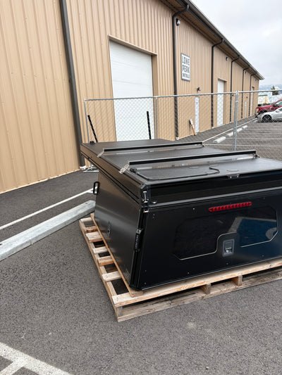 Used Tall V1 — Toyota Tacoma 5 ft Bed — alternate view of the Lone Peak Camper V2 build; cab passthrough window