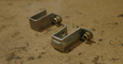 Upgraded J-Hooks — reinforced J-hooks for mounting the Lone Peak Camper V2 to the truck bed; gusseted construction, hexagonal rivnut prevents spinning