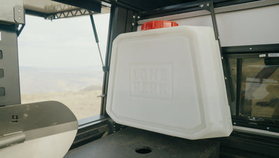 The Tank for the Lone Peak Camper V2 — 10 gallon rotomolded water tank with on-demand 1.2 GPM pump for the Lone Peak Camper; auto shut-off when empty